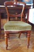 Early 20th century mahogany foldover swivel-top tea table on square tapering legs,