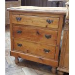 Pine chest of three long graduated drawers, on bun feet,