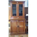 Victorian walnut glazed bookcase with pair of panelled doors enclosing adjustable shelves,