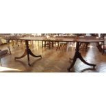 George III style mahogany D-end extending double pedestal dining table on reeded swept supports