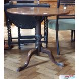 Georgian mahogany circular tilt-top tripod table on carved column support to tripod splayed legs,