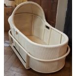 Lloyd Loom style wicker cradle with removable legs
