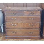 19th century oak chest of drawers of two short and three graduating drawers,