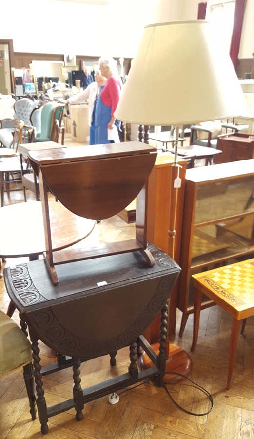 Stained oak gateleg table on spiral supports,