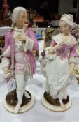 Pair continental porcelain figures of lady and gallant, each wearing 18th century style dress,