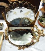 Gilded and floral oval toilet mirror,