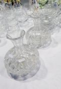 Two cut glass decanters with bulbous bases, cake stand,