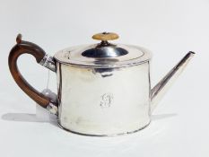 George III silver teapot of oval straight sided form and having bead borders and engraved initial,