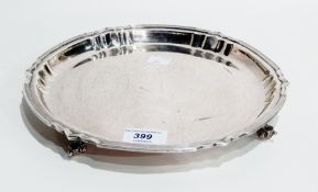 20th century silver salver, angular/circular form, on four scroll feet, Sheffield 1932, 25.