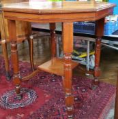 Late 19th century walnut octagonal top table with ring turned legs united by cross-stretcher,