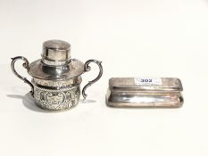 An Edwardian rectangular silver pin box with hinged cover,