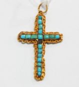 Gold-coloured metal and turquoise cross pendant with looped borders (one stone missing)