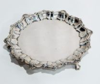 Edwardian silver salver with wavy shell and scroll border, on claw and ball feet, London 1904,