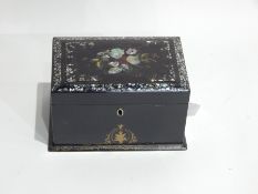 19th Century black lacquer and mother-of-pearl inlaid tea caddy with painted decoration and having