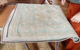 Laura Ashley cotton and wool rug in shades of pale cream, blue and green,