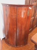 Georgian mahogany bowfront wall hanging corner cupboard