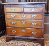 Georgian mahogany bachelor's chest with brushing slide, three long and two short drawers,