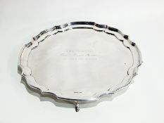 George V silver presentation salver with pie-crust border, raised on pad feet, Sheffield 1935,