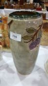 Royal Doulton stoneware vase, cylindrical tube-line decorated with branches of plums,