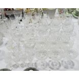 Large collection of cut glass to include wine goblets with floral engraving, brandy balloons,