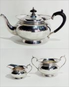 Early 20th century silver three-piece teaset of oblate form with flared rim,