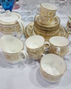 Royal Worcester "Hyde Park" pattern teaset in gold and white,