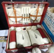 20th century picnic hamper with four forks, four knives, four spoons, cups,