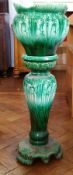 Edwardian green glazed pottery jardiniere and stand, foliate design,