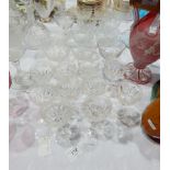 Etched champagne glasses with floral decoration and other wines
