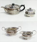 Early 20th century silver teaset of oblate half-gadrooned bodies,