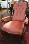 Victorian walnut open arm drawing room chair on carved cabriole supports