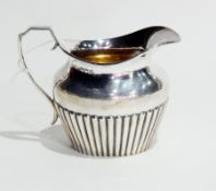 Edward VII silver cream jug with half-reeded body, London 1902, height 9cm, 5oz approx.