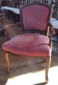 19th century style armchair with upholstered padded back and stuffover seat,