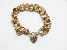 9ct gold triple circular link bracelet with padlock clasp, 24g approx.