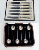 Set of six silver-handled tea knives, cased with set of six silver coffee bean spoons,