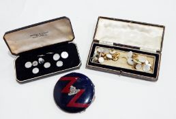 Two sets of mother-of-pearl dress studs,