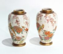 Pair Japanese satsuma pottery vases, exotic bird and flowering branch decorated,