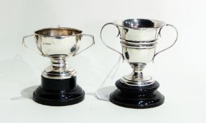 Edwardian silver three-handled trophy cup on raised circular base, Sheffield 1907,