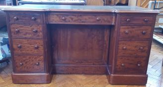 Victorian flame-mahogany kneehole desk with inset leather writing surface, frieze drawer, cupboard,