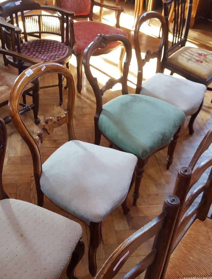 Pair of Victorian rosewood balloon back dining chairs with upholstered stuffover seats,