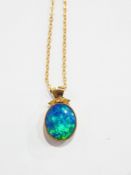 Gold-coloured metal and opal doublet pendant (unmarked),
