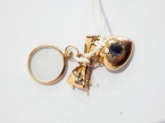 Gold bow brooch,