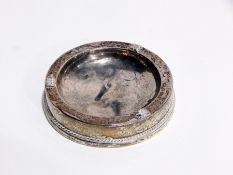 Mid 20th century silver circular dish with wide rim interspersed with square-shaped rose motifs to