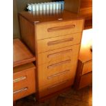 G-Plan matching chest of six short drawers, raised on a plinth base,