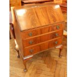 An early 20th century mahogany bureau, with fitted interior,