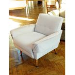 Contemporary arm chair with button back,