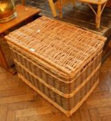 A wickerwork linen basket,