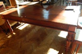 An Eastern hardwood rectangular top dining table with moulded edge top, plain frieze,