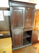 A hardwood cupboard with straight moulded pediment,