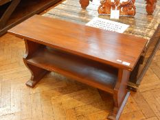 A rectangular top hardwood side table with two frieze drawers, wood slatted shelf below,